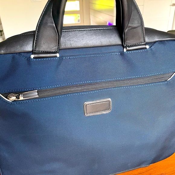 TUMI soft “briefcase” portfolio bag.